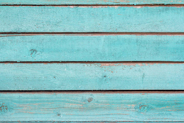 old wooden wall painted blue, weathered wooden background with nails and slits. - Fotografie, Obrázek
