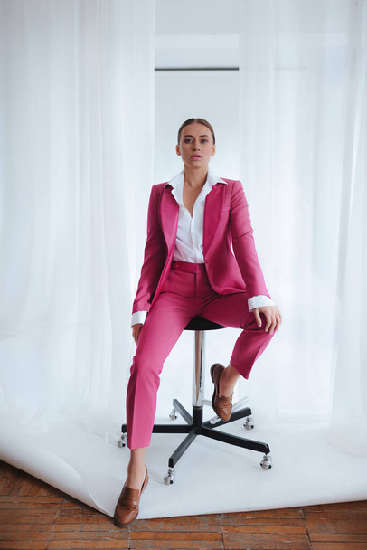 Girl in a pink suit. Business style.Trend of 2021. Natural female beauty. - Fotografie, Obrázek