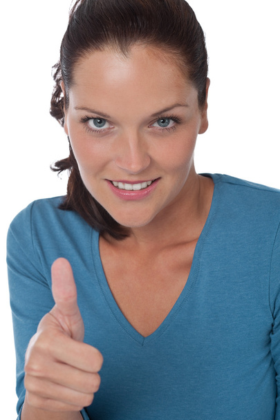 Young brown hair woman showing thumbs-up - Fotó, kép