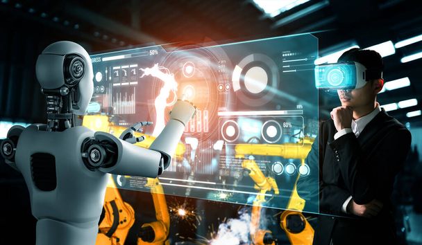 Робот механизированной промышленности и человеческий работник, работающие вместе на будущем заводе - Фото, изображение