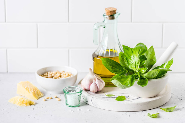 Pesto Ingredients: Fresh Basil, Pine Nuts, Olive Oil and Cheese, copy space for your text - Foto, afbeelding