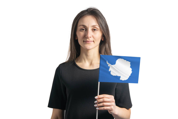 Happy young white girl holding Antarctica flag isolated on a white background. - Φωτογραφία, εικόνα