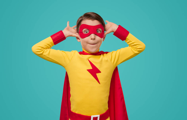 Funny boy in superhero costume - Foto, Bild