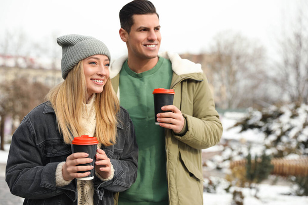 Beautiful happy couple outdoors on winter day - Photo, Image
