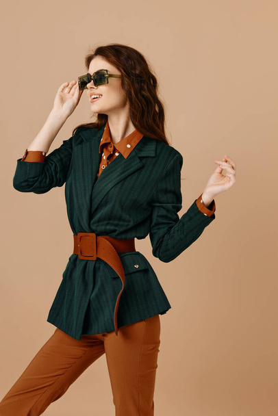 cheerful woman in suit trendy blazer glamor home isolated background - Valokuva, kuva