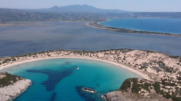 Aerial panorama view of the famous semicircular sandy beach and lagoon of Voidokilia in Messenia, Greece - Footage, Video