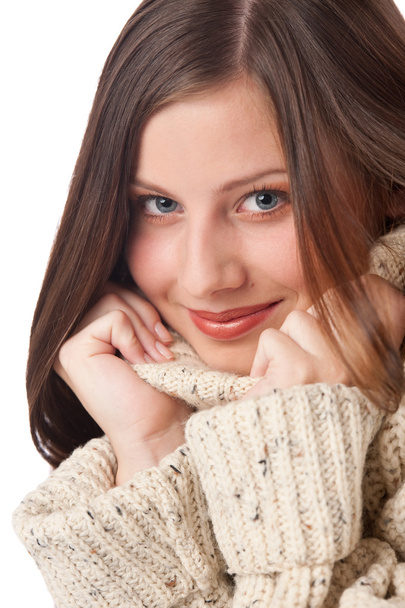 Portrait of beautiful young woman wearing turtleneck on white background - Foto, afbeelding
