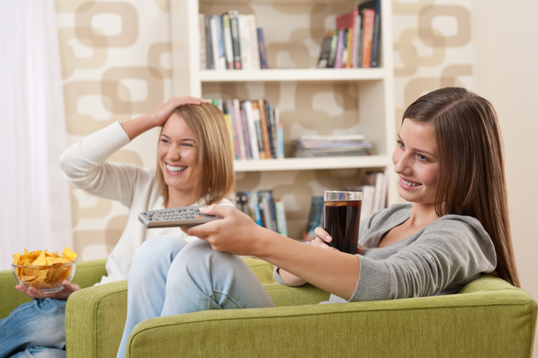Students - Two female teenager watching television - Fotoğraf, Görsel