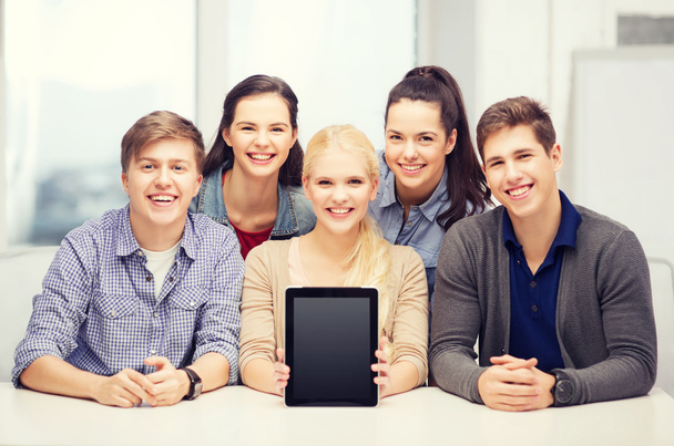 smiling students with blank tablet pc screen - 写真・画像
