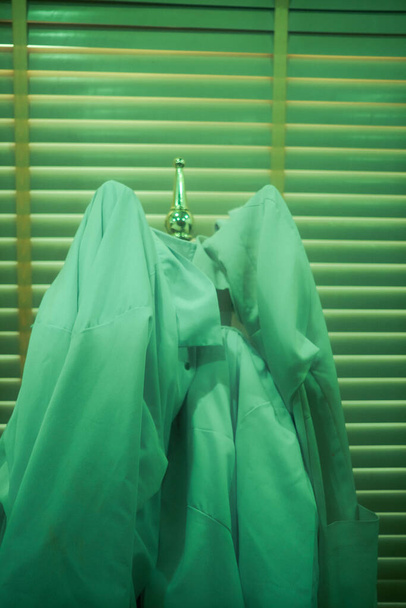 photo of hanging lab coat - Photo, Image
