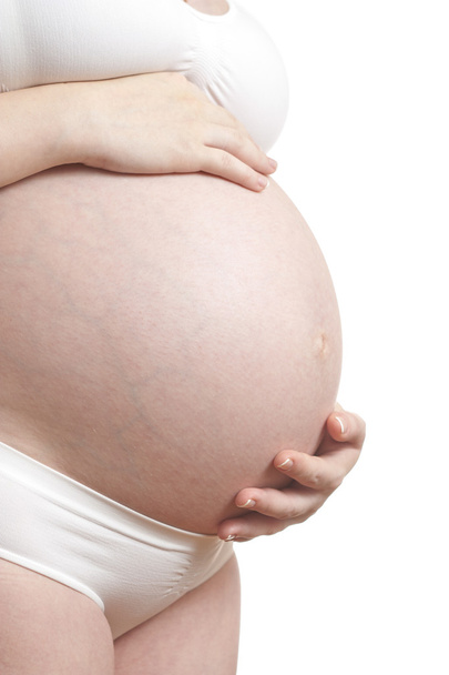 Studio shot a pregnant woman - Foto, Imagen