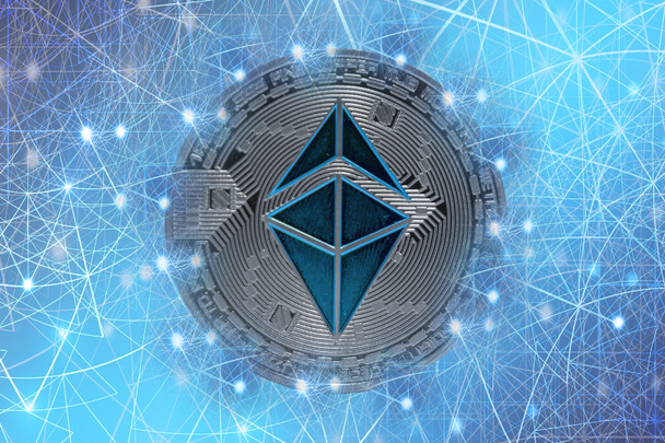 valueable silver blue ether crypto currency connected with the network - Photo, Image