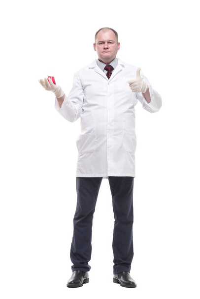 in full growth. researcher with a laboratory flask in his hands. - Foto, imagen