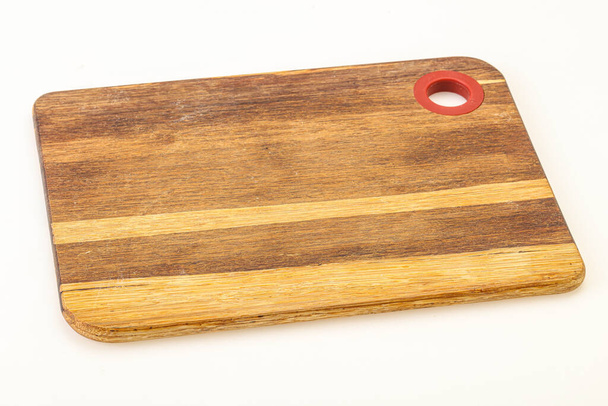 Натуральна дерев'яна дошка для різання на кухні
 - Фото, зображення