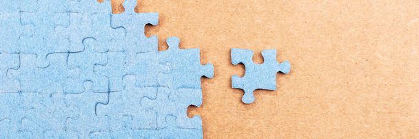 Panoramic image blue jigsaw puzzle with copy space. Business strategy Teamwork and problem solving concept - Photo, Image