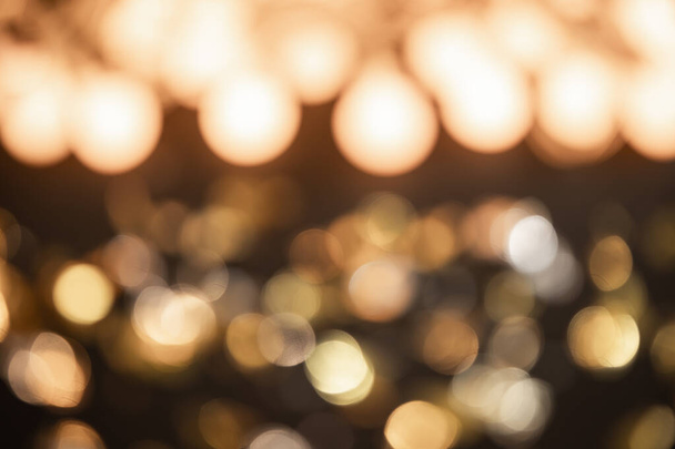Kulta valo Juhlava joulun tausta. Abstrakti tuikkivat kirkas tausta bokeh defocused kultainen valot - Valokuva, kuva