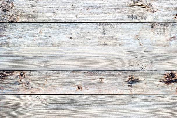 Struktura prken starého dřevěného stolu ve starožitných světlých pastelových barvách. Ročník rustikální dřevěné pozadí. Tesařství. - Fotografie, Obrázek