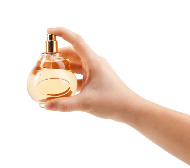 mujer manos rociando perfume - Foto, imagen