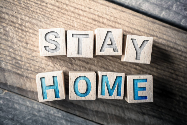Stay Home Written On Wooden Blocks On A Board - Photo, Image