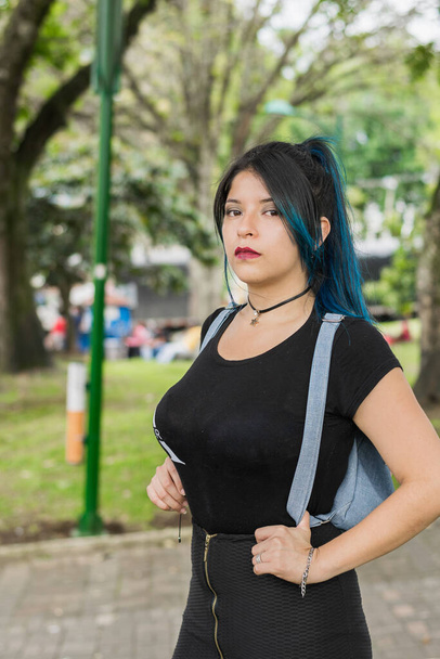 Blue Haired Latin College Girl Walking Through The Park Dressed In Black - Фото, изображение