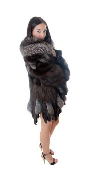 Portrait of the girl in a fur coat - 写真・画像