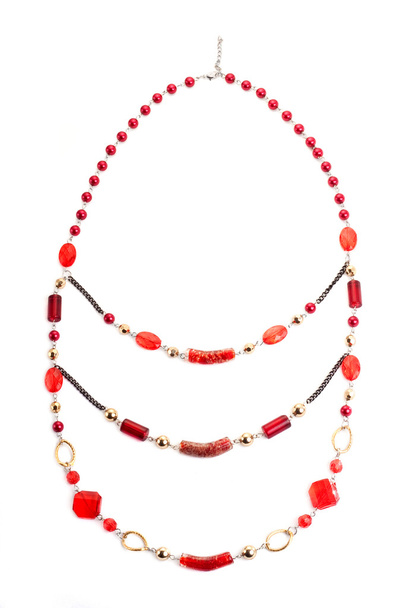 Collar de gema roja en blanco
 - Foto, Imagen