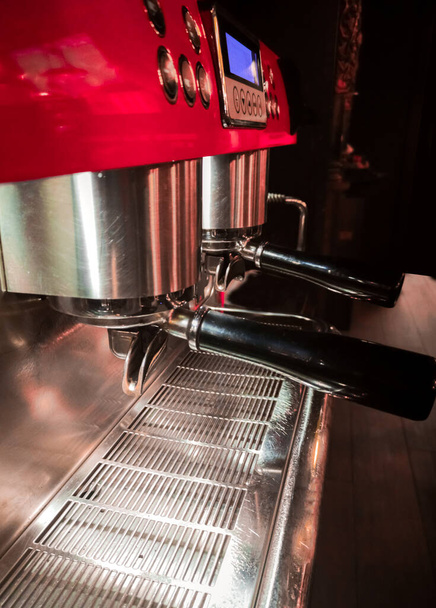 A vertical closeup of an espresso machine in a cafe - Photo, image
