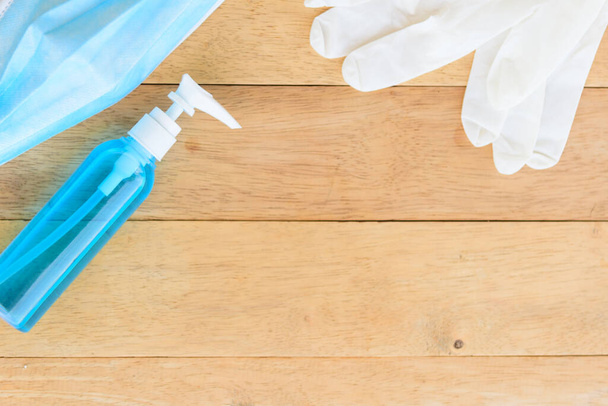 sanitizer gel for cleaning the hand and Medical rubber gloves on background - Fotó, kép