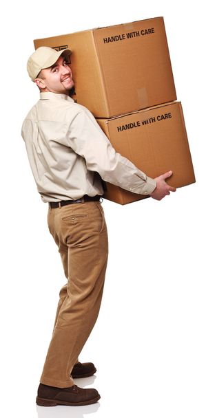 delivery man with parcel rear view isolated on white - Foto, imagen