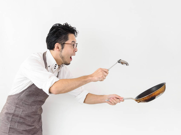 A imagem de um homem ansioso para cozinhar - Foto, Imagem
