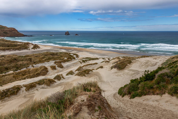 Die Bucht des fliegenden Sandes auf der Halbinsel Otagao im Süden Neuseelands - Foto, Bild