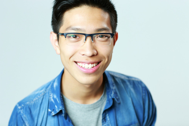 Young handsome asian man in glasses - 写真・画像