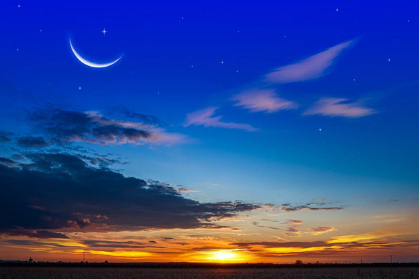 Crescent moon with beautiful sunset background . bright sky - Photo, Image