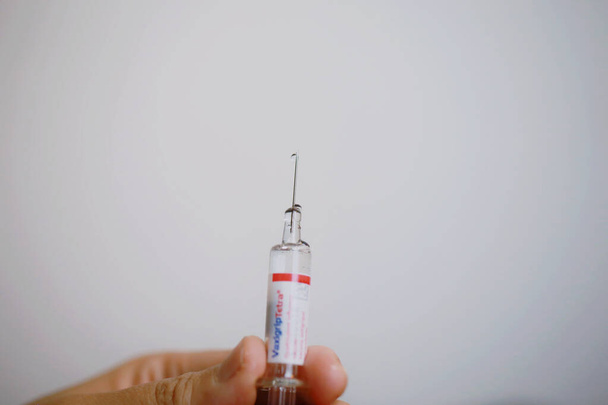 MELAKA, MALAYSIA - Jan 27, 2021: Malacca, Malaysia- 27 January 2021. The photograph of vaccine syringes conceptual. Vaccine demand from other countries raised to face the COVID-19. - Zdjęcie, obraz