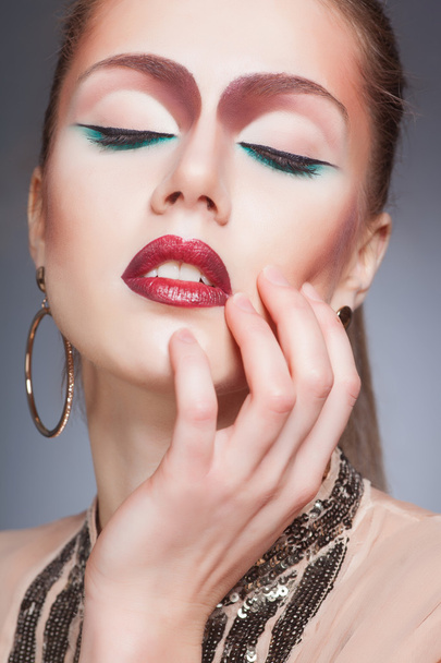 Fashion beauty portrait of sexy woman with creative make-up - 写真・画像