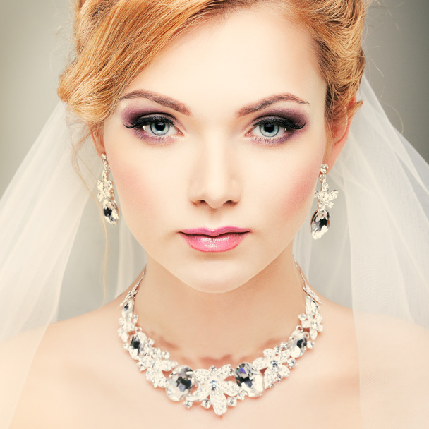A photo of sexual beautiful girl in a wedding-dress is in fashion style. Wedding decorations - Valokuva, kuva