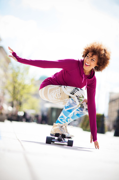 Woman skateboarding - Foto, immagini