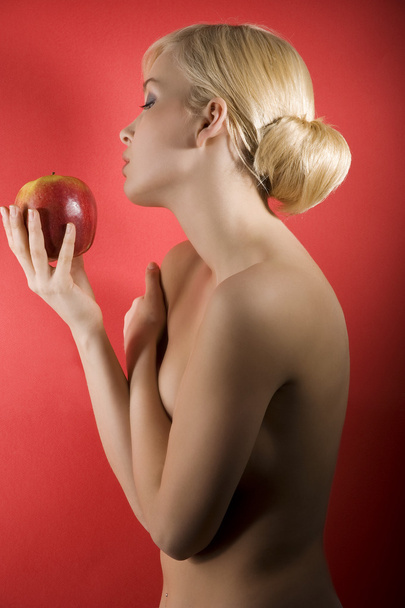 Sexy woman with red apple - Zdjęcie, obraz