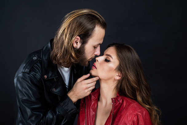 fashionable couple in love of man and woman wear leather jacket, love - Foto, immagini