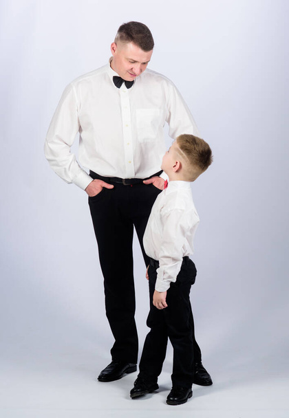 aristocrat male. happy child with father. business meeting party. father and son in formal suit. little boy with dad businessman. family day. tuxedo style. trust and values. male fashion. aristocrat - Фото, зображення
