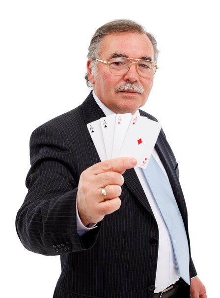 Senior man showing the four aces - Photo, Image