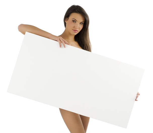 jonge naakte vrouw dekking lichaam met een witte advertentie display - Foto, afbeelding