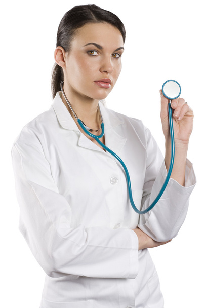 young brunette in medical doctor dress with stethoscope Isolated over white background - Foto, Bild