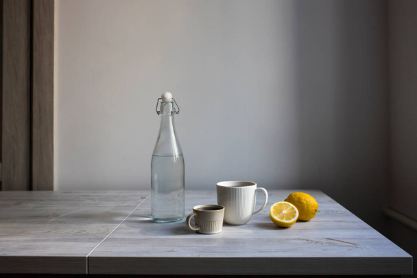 Minimalistic Scandinavian style. two cups of coffee of different sizes for two on a tray on the table. - Photo, image