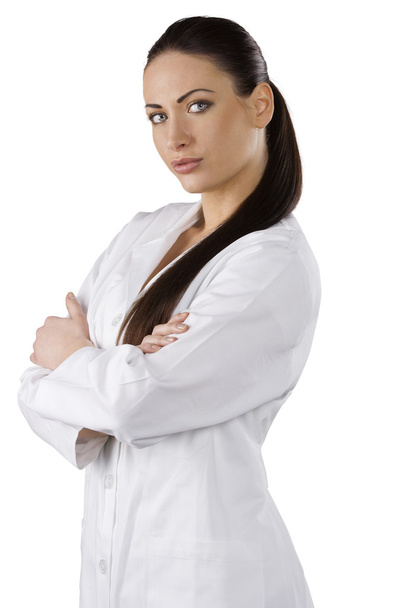 very cute brunette woman with stunning eyes in white gown as a medical doctor - Foto, Imagem