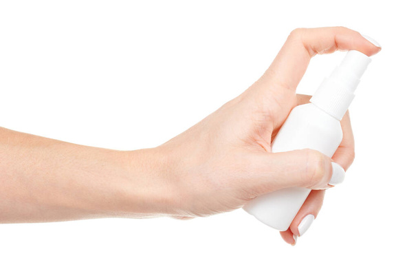 Hand with white plastic hand antiseptic isolated - 写真・画像
