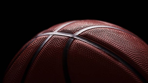 Espalda retroiluminada de una pelota de baloncesto sobre fondo negro. Banner horizontal. - Foto, imagen