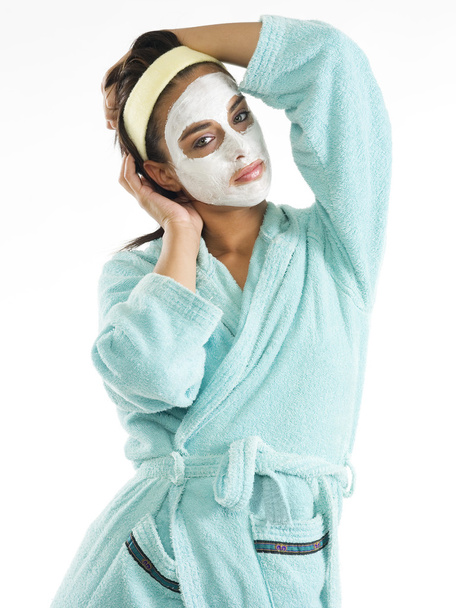 cute and nice girl with face cream mask and posing - Фото, зображення