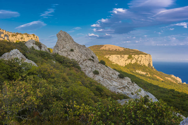 Temple of the Sun - rocks surrounded by forest in the mountains of Crimea - Фото, изображение
