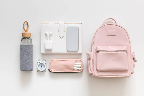 Female backpack stationery, clothes. Student bag storage organization. Concept of back to school - Foto, Imagem
